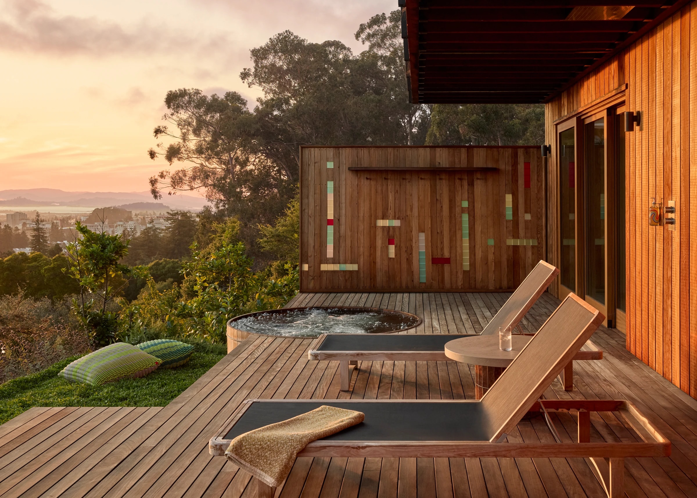 Sunset deck with a sunken hot tub and teak loungers